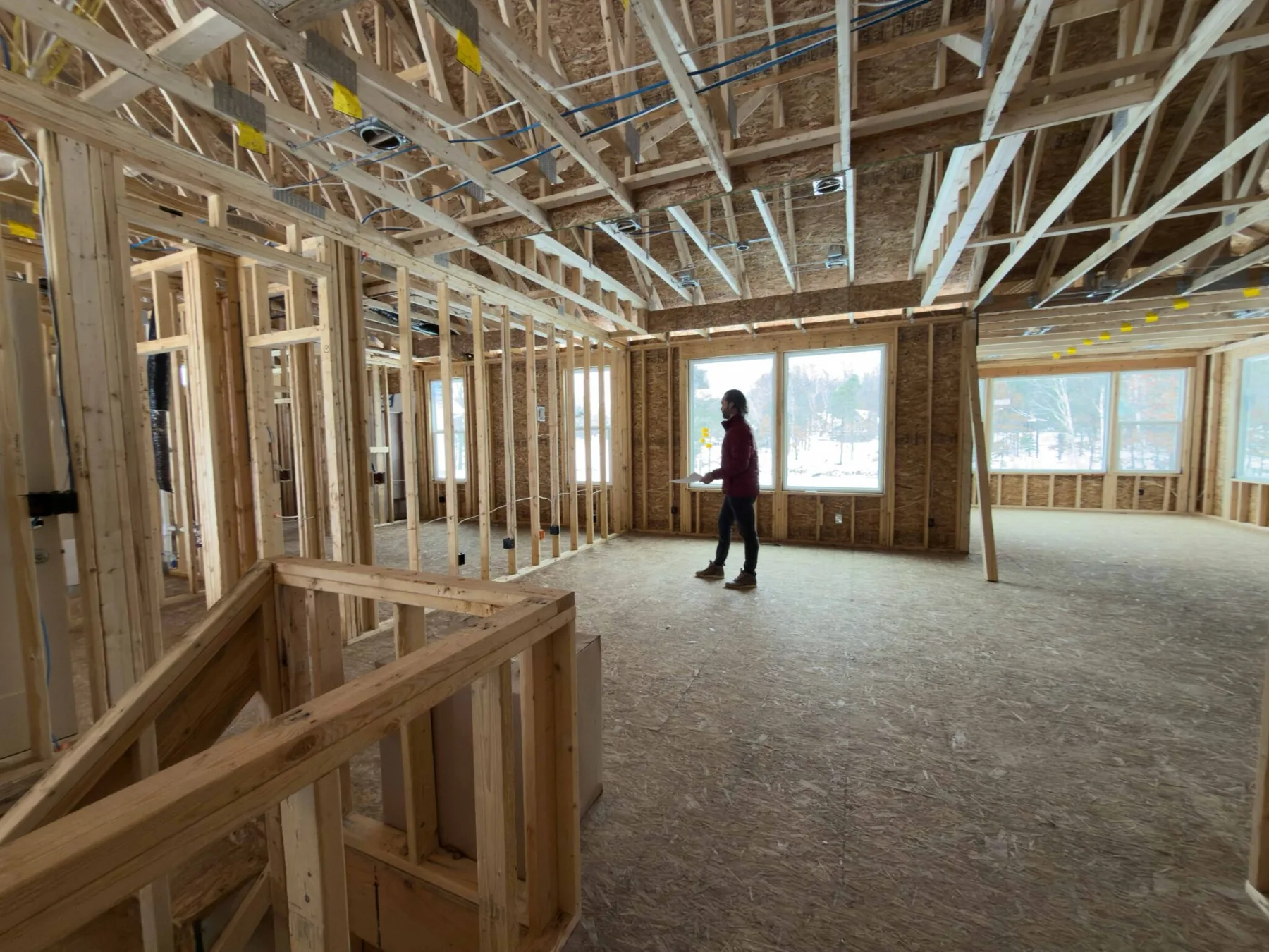 Interior of a home under construction, framing and window openings