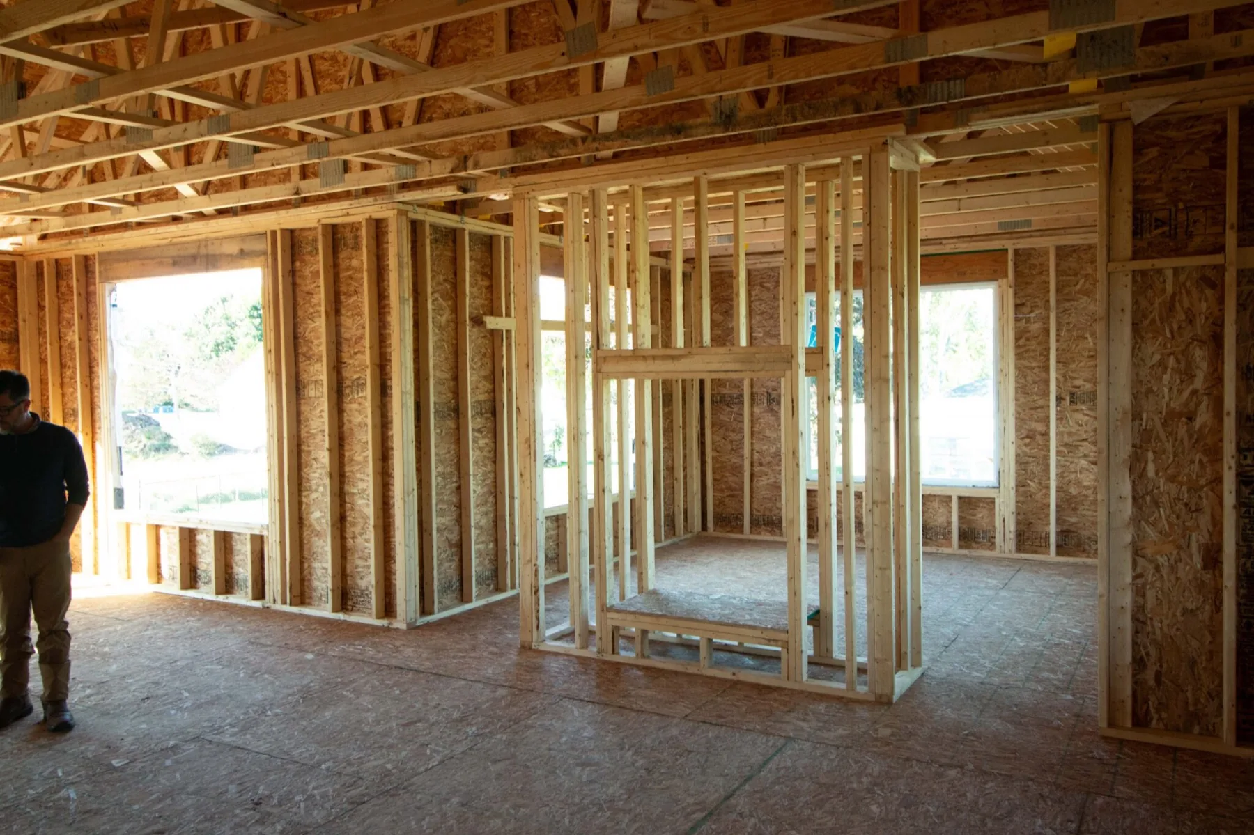 Framed interior walls and open floor structure of a home in progress