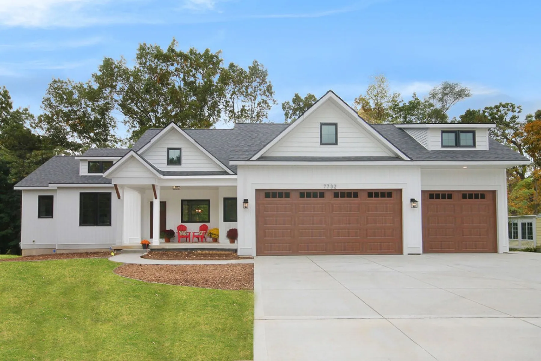 Custom home with a covered porch built by LOYL Construction